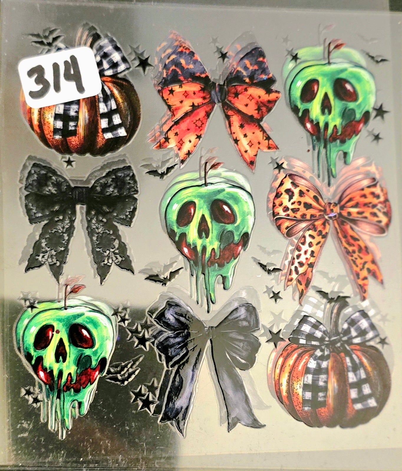 #314 Pumpkin bows and green ghoulie face decal