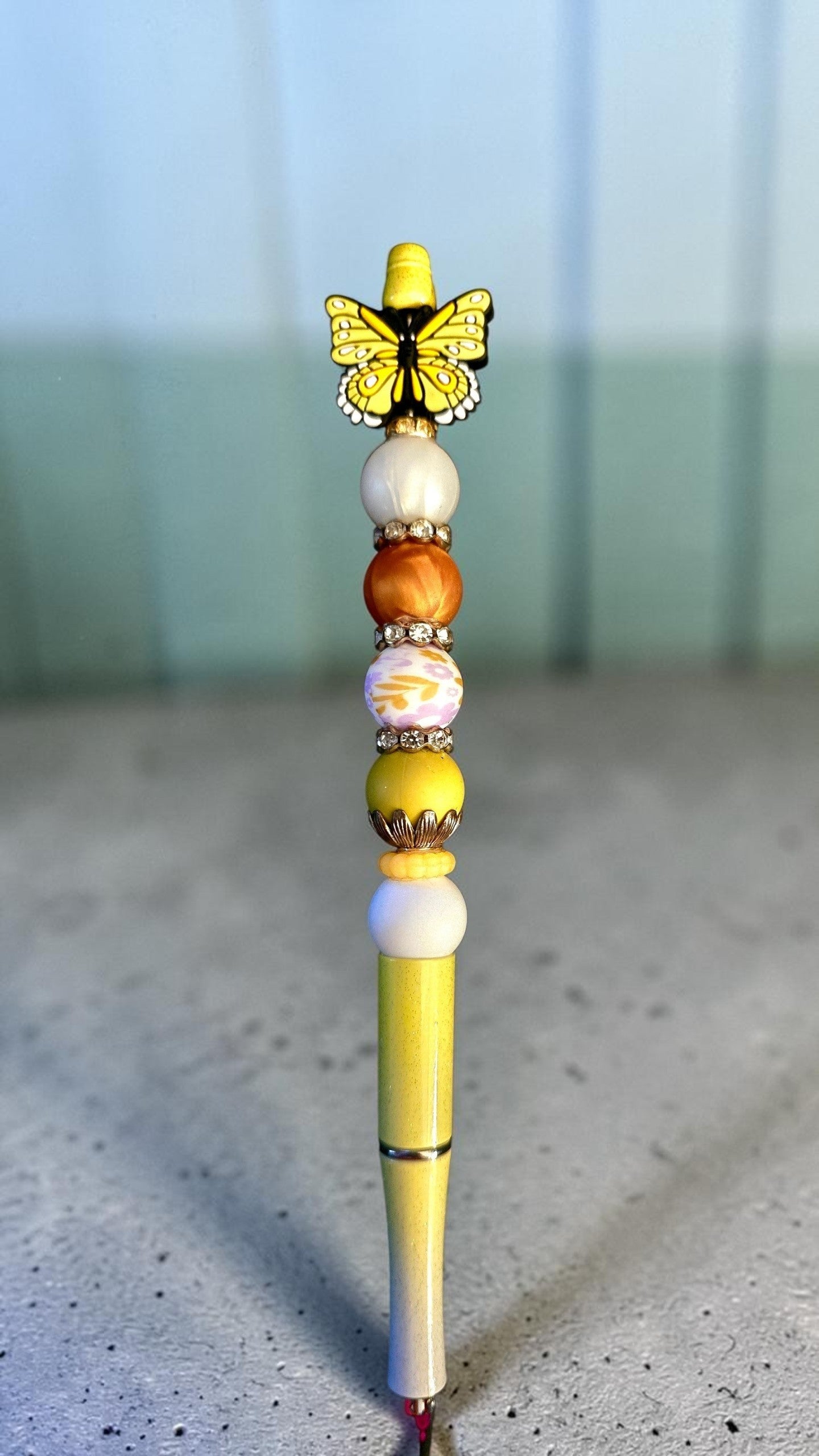 Yellow butterfly extended pen